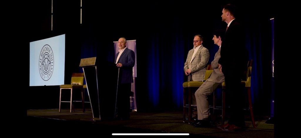 Brian Hopper Sr. addresses the Center for Baptist Leadership along with Faith Baptist member Bill Iffland and attorney James Lawrence during the Southern Baptist Convention.